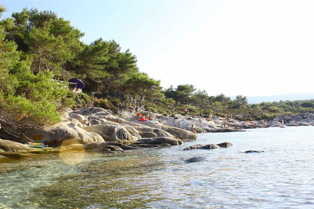 The turquoise water and granite coves of Kavourotrypes on Sithonia in Halkidiki, a Halkidiki yacht charter anchorage