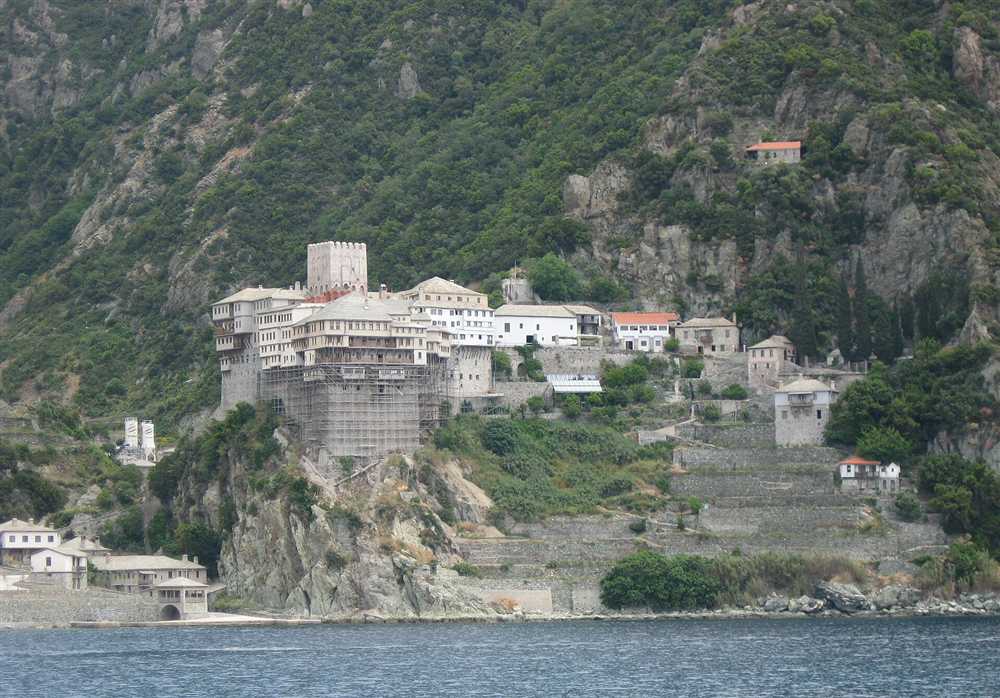 The Dionysiou Monastery on its cliff above the sea on the Mount Athos coast, a Halkidiki yacht charter view