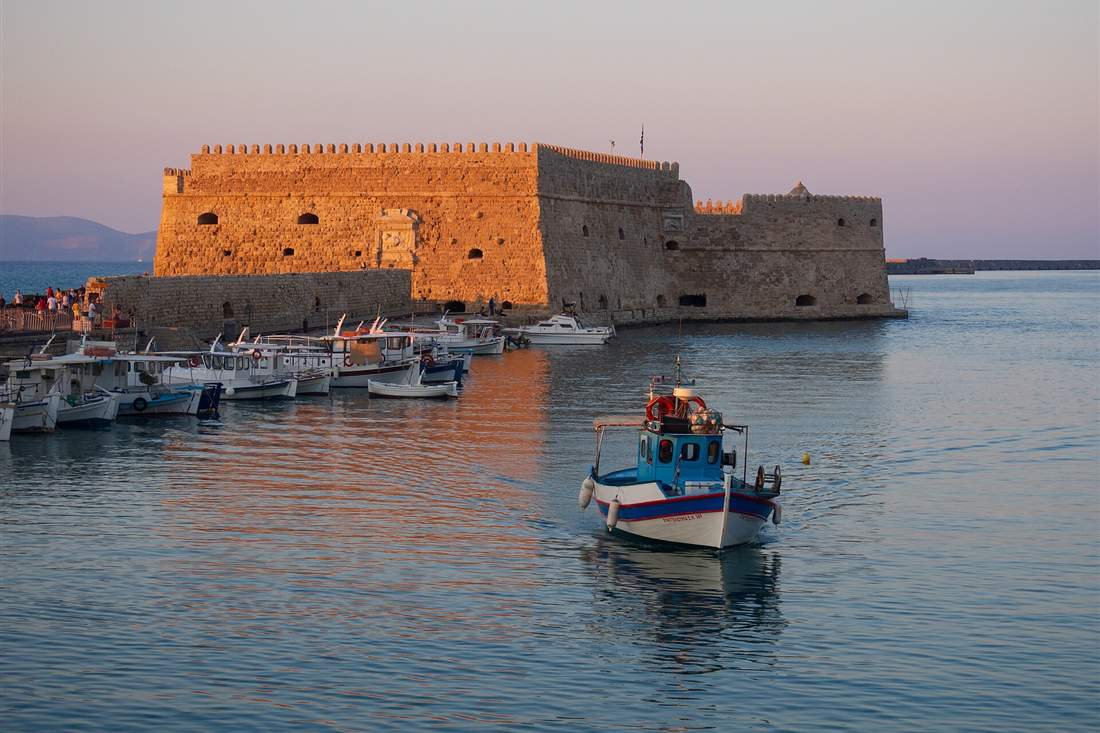 Koules fortress at the entrance to the old port of Heraklion at sunset