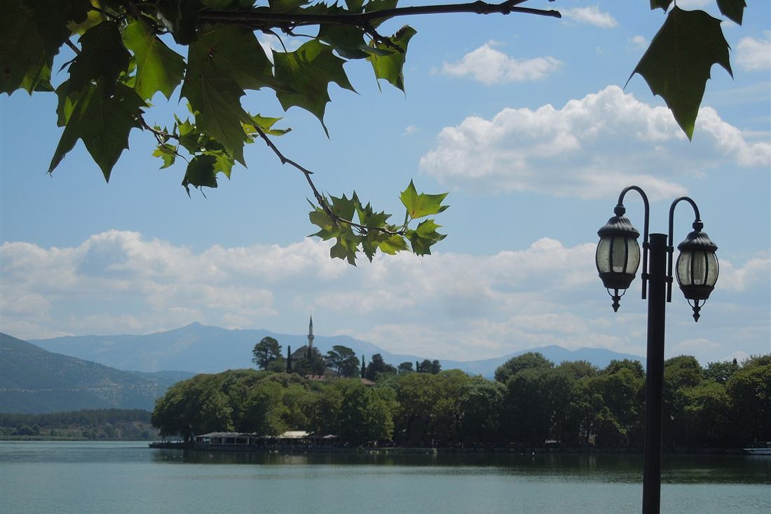 Ioannina castle peninsula and minaret on Lake Pamvotida, start of an Ioannina food tour