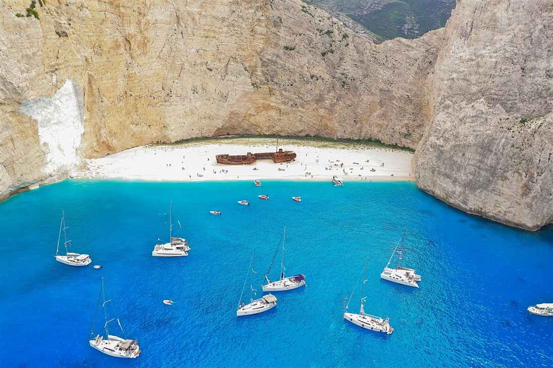 Navagio shipwreck beach on Zakynthos with boats on an Ionian islands tour