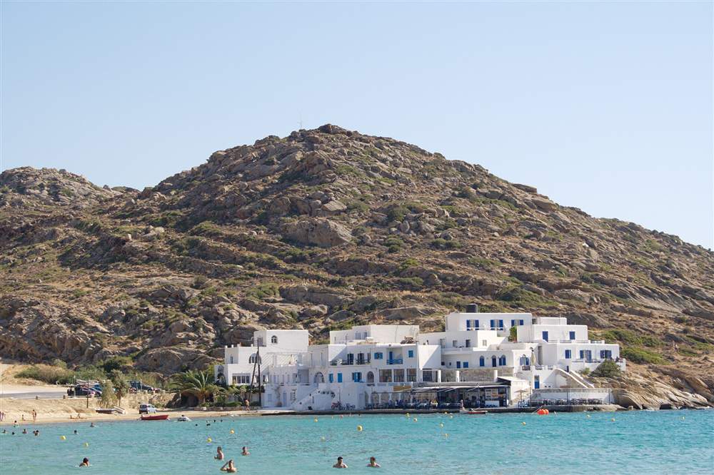 The turquoise bay of Mylopotas beach on Ios, an Ios yacht charter anchorage