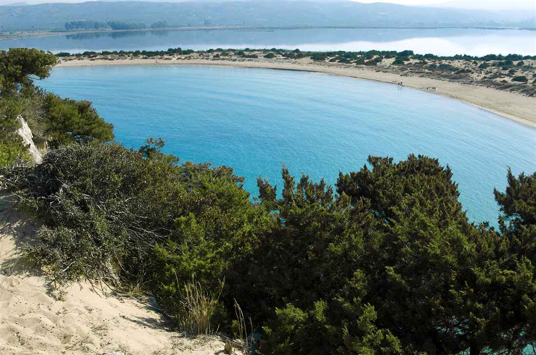 The horseshoe bay of Voidokilia beach in Messinia near Kalamata, reached by airport transfers from Kalamata Airport