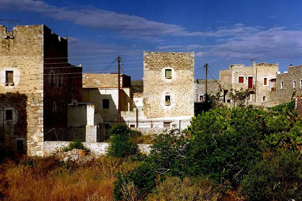 Stone tower houses in a Mani village, the fortified architecture the five-hour Mani run visits