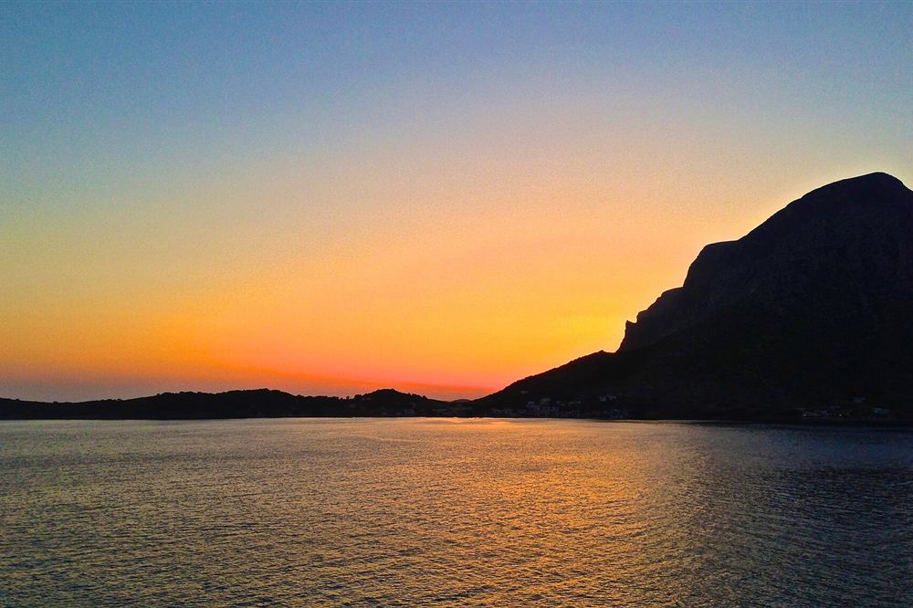 Telendos island at sunset seen from the Masouri coast of Kalymnos