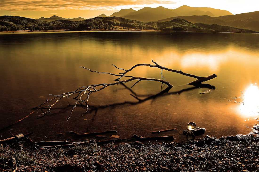 Lake Plastira at sunset under the Agrafa mountains in Karditsa