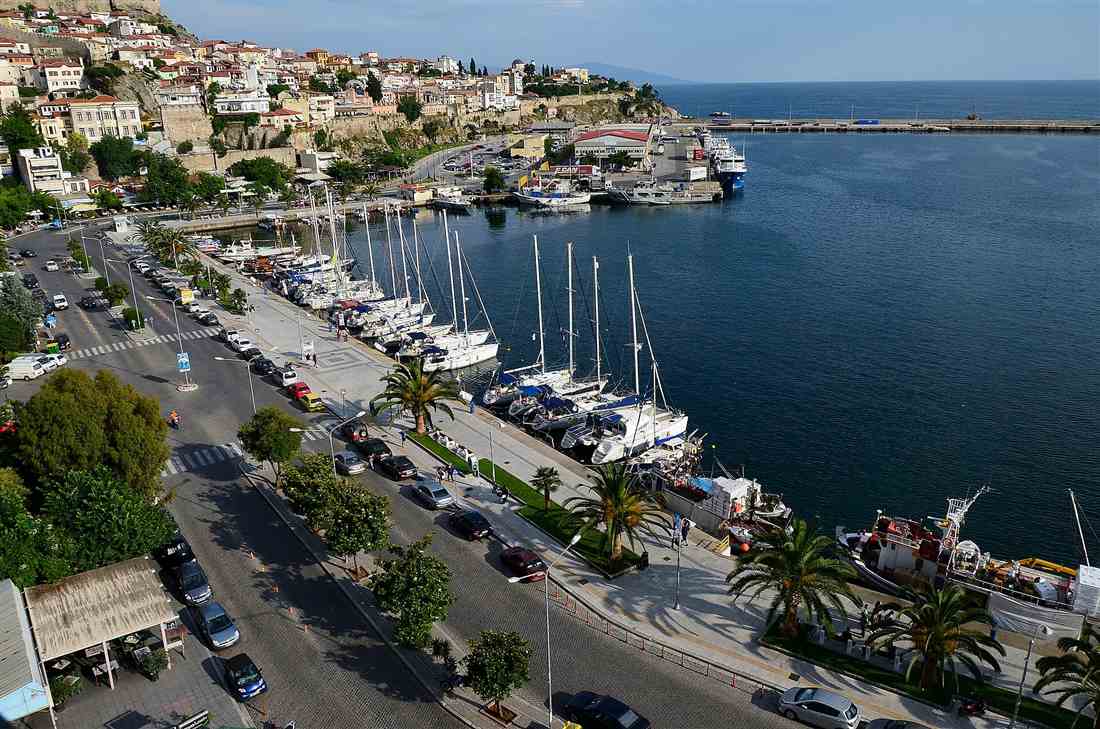 Sailing yachts moored in the Kavala marina below the old town of Panagia, a base for a Kavala yacht charter