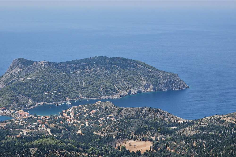 The village of Assos on its isthmus below the Venetian fortress