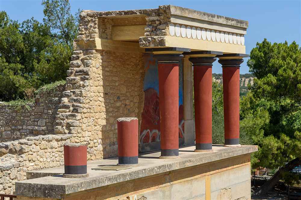 The north entrance of Knossos with the bull fresco and Minoan columns