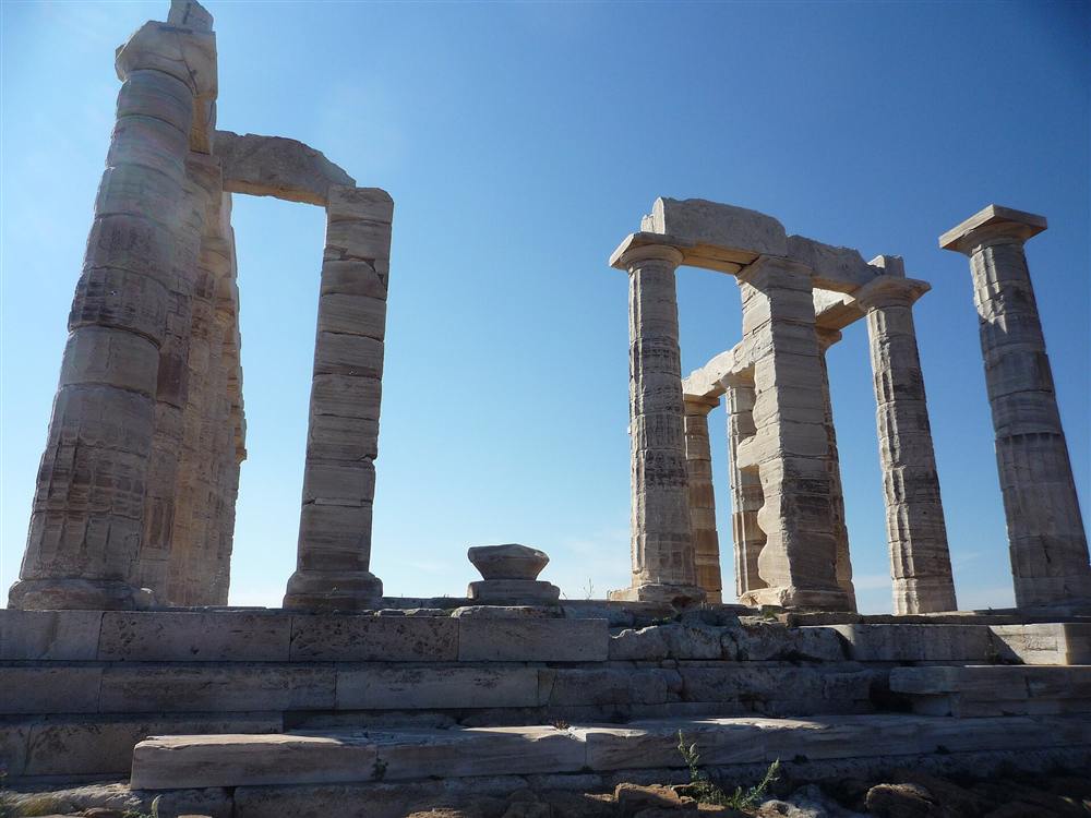 The marble columns of the Temple of Poseidon at Cape Sounion on the coast near Lavrio