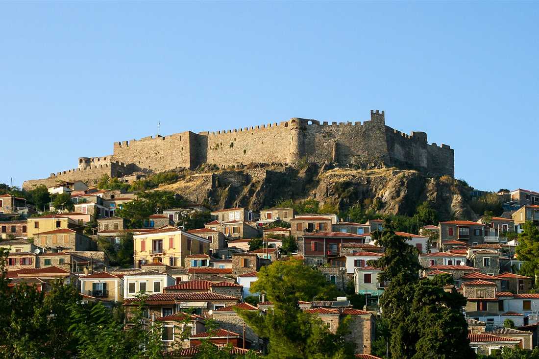 Lesbos island tour reaching Molyvos below its Genoese castle