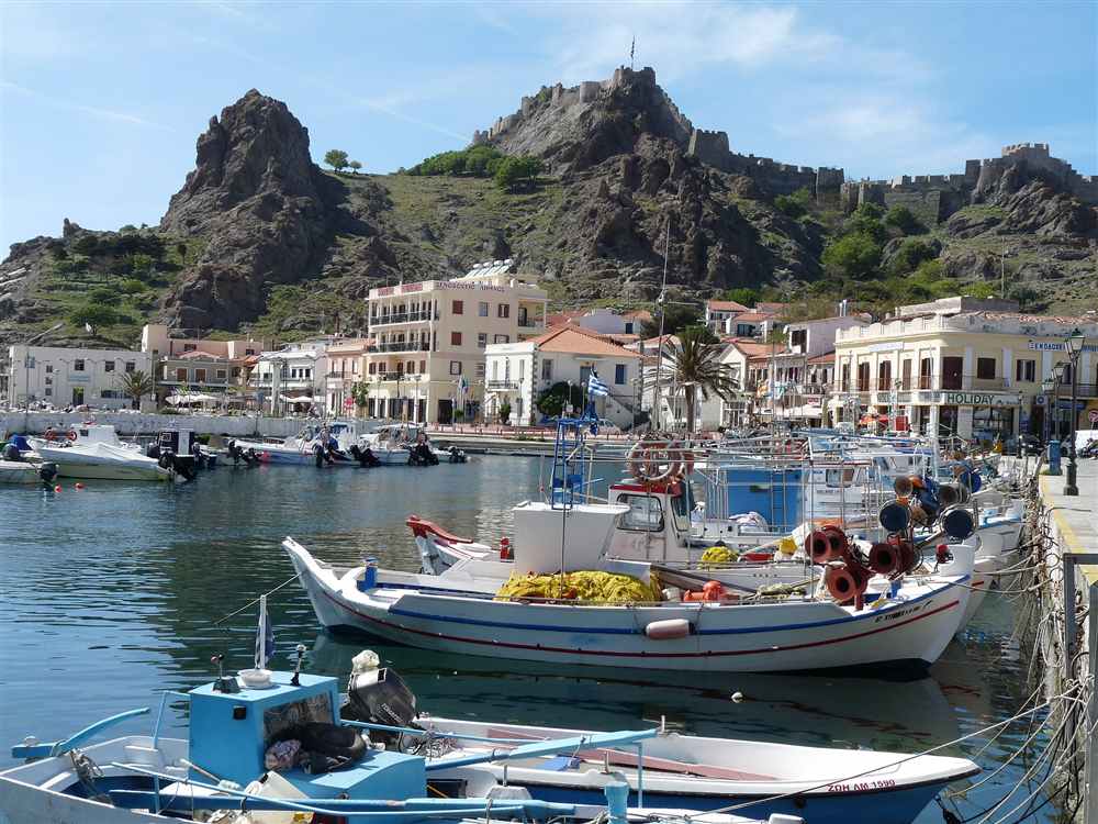 The fishing harbour of Myrina below its Venetian castle on Limnos, Greece