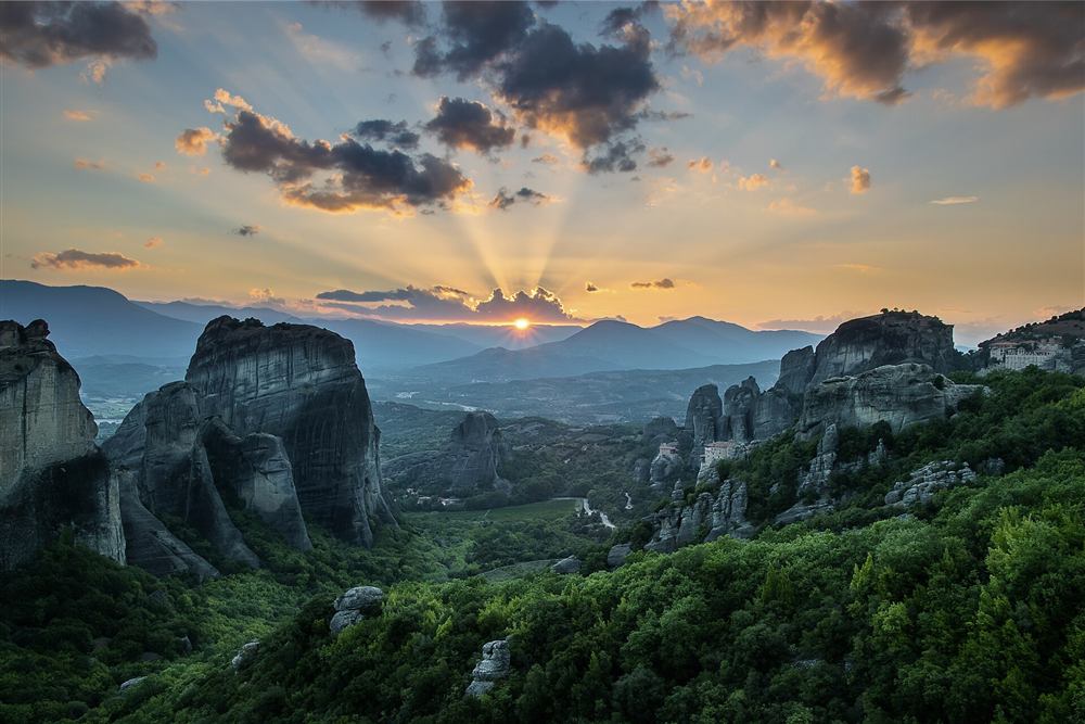 The Meteora rock forest as the sun drops behind the western ridge