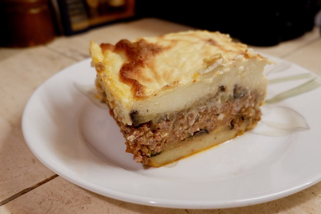 A slice of moussaka baked in a Nafplio kitchen, one of the dishes on the class menu