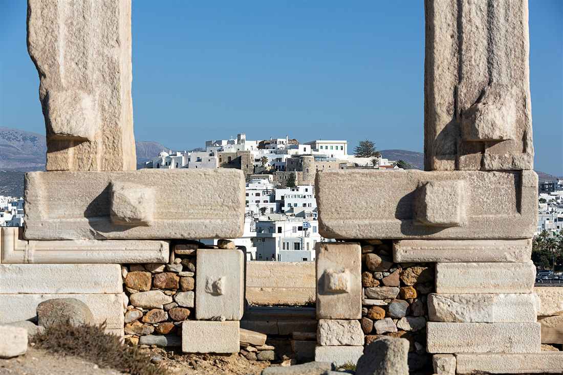 The Portara of Naxos framing the Old Town and Kastro of Naxos Town