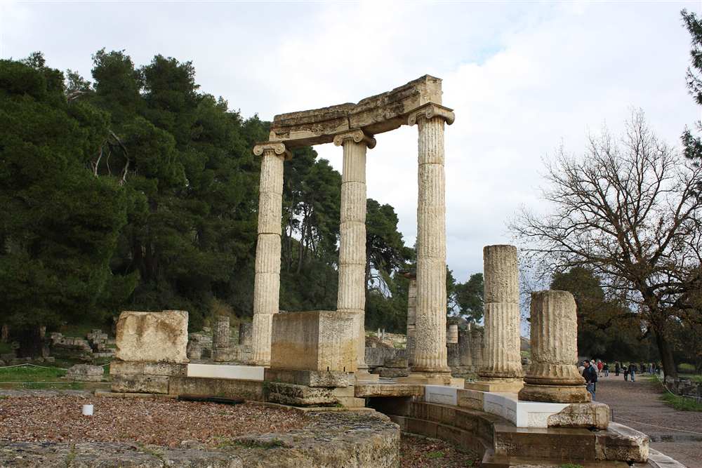 The circular Philippeion among the pines at the archaeological site of Ancient Olympia