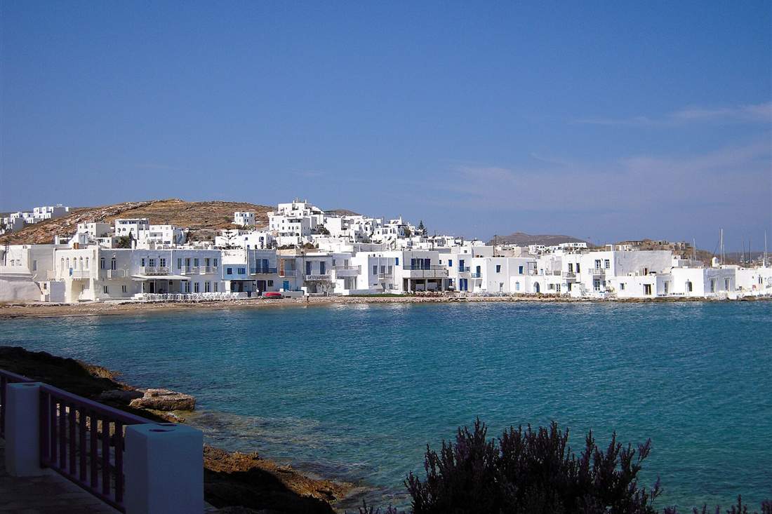 The white waterfront of Naoussa on Paros above turquoise water