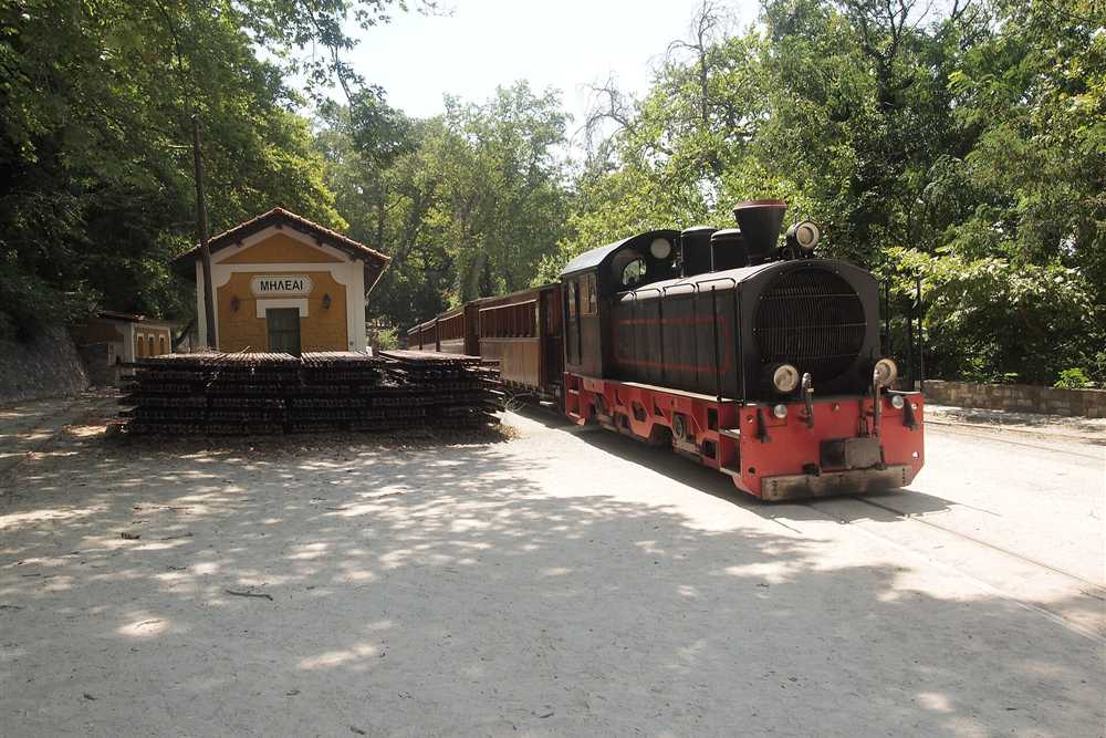 The Moutzouris narrow-gauge train at Milies station, the stop that closes the village route
