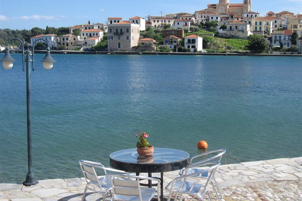 The harbour of Galaxidi below Delphi with the old captains houses across the water