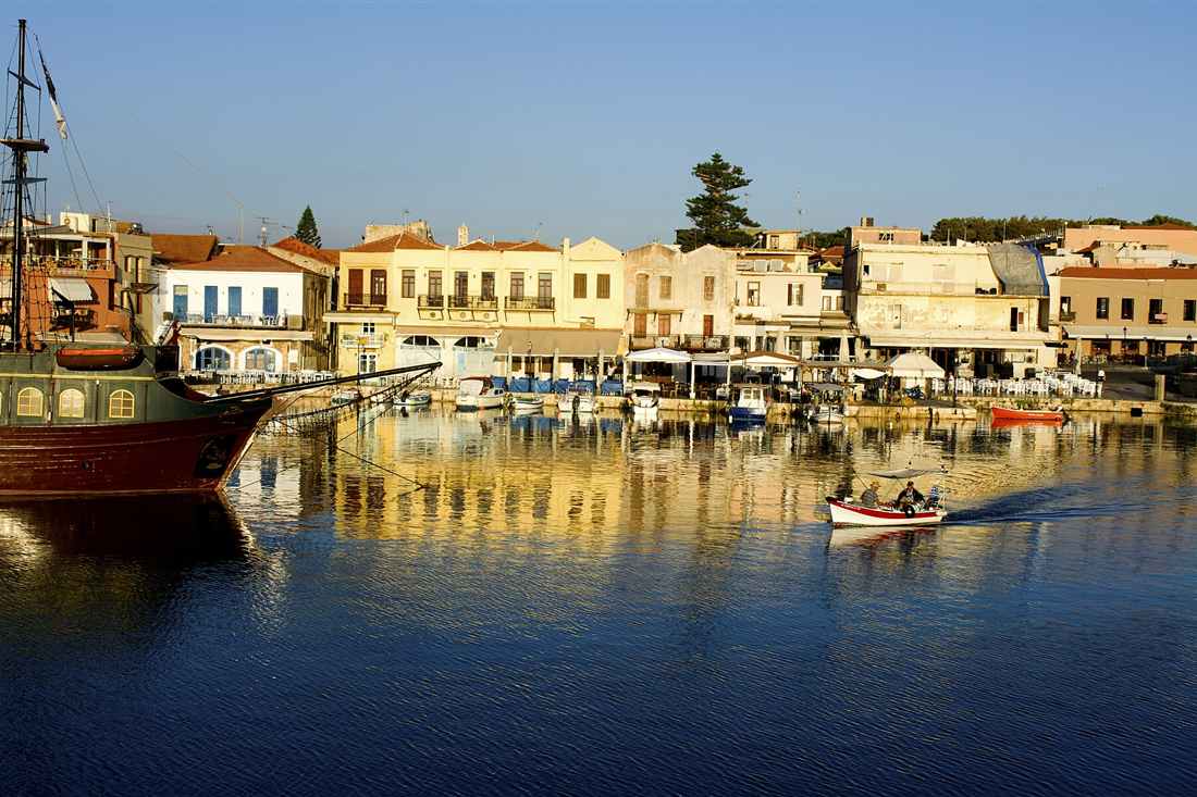 The pirate galleon moored in the Venetian harbour of Rethymno, where the day boats leave
