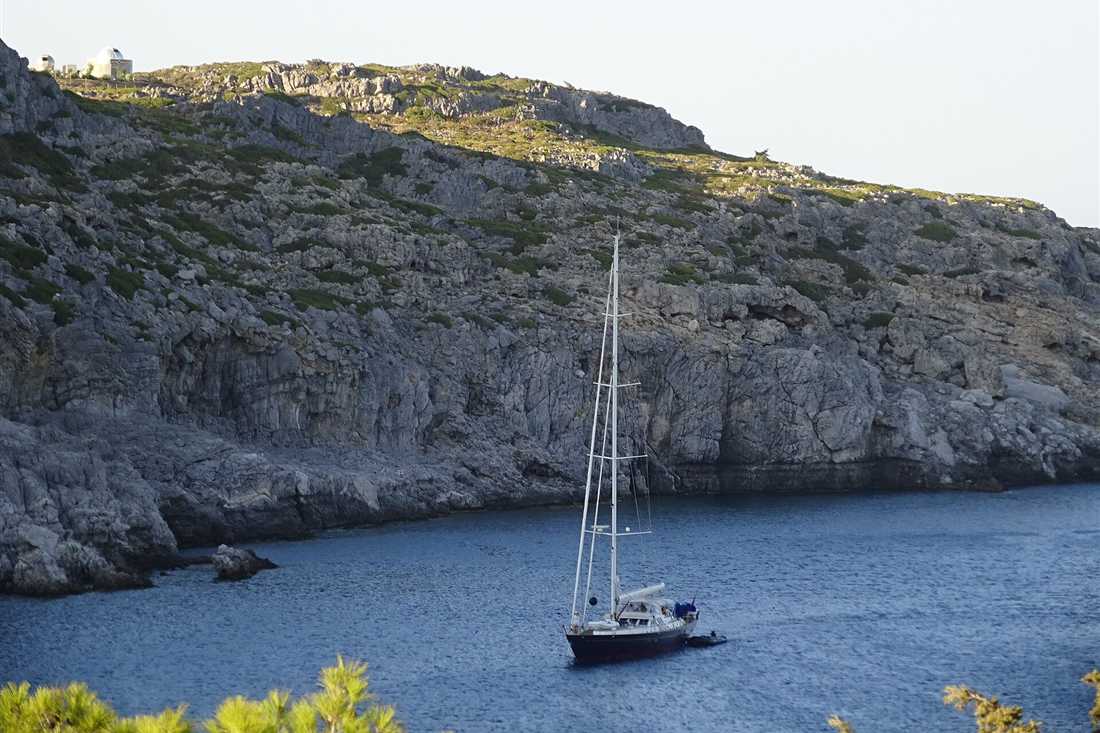 Rhodes catamaran cruise yacht at anchor in Anthony Quinn Bay