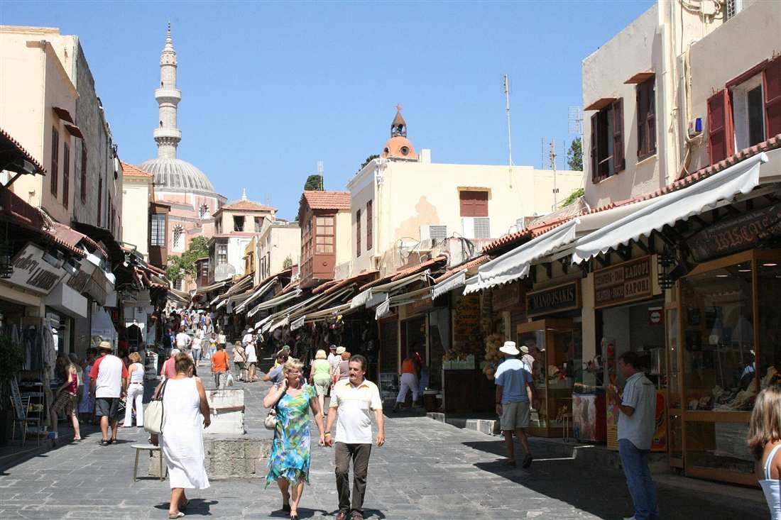 Rhodes old town walking tour on Sokratous Street below the Suleiman Mosque