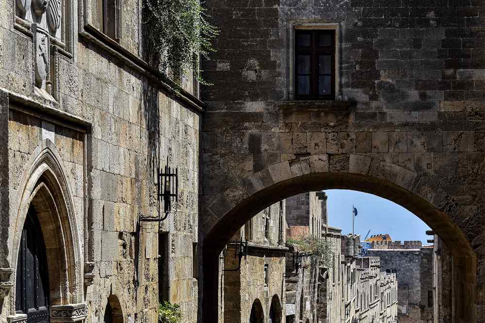 Rhodes old town walking tour stop at the Street of the Knights arcade