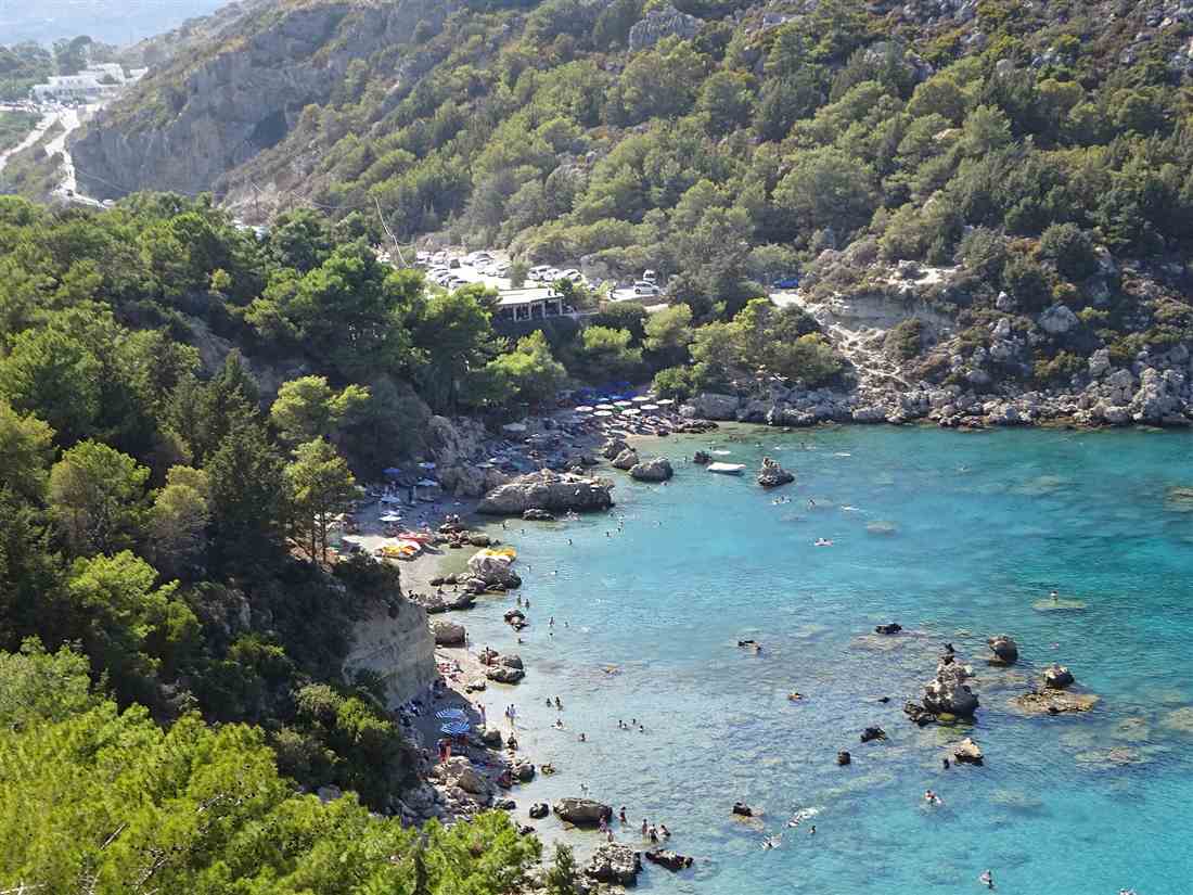 The turquoise water and submerged rocks of Anthony Quinn Bay on the east coast of Rhodes, the best-known spot for Rhodes snorkeling