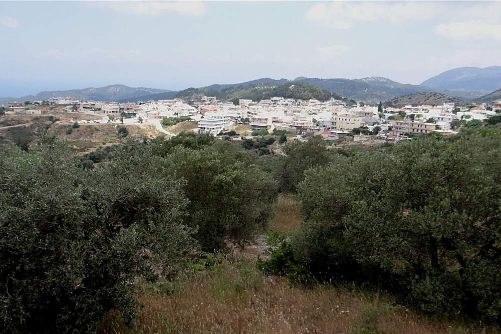The wine village of Embonas seen across its olive and vine terraces