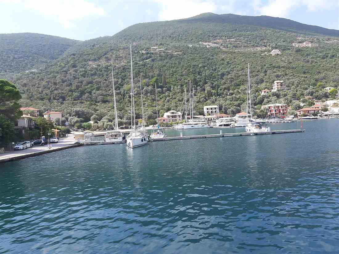 Sailing yachts moored stern-to along the quay in the sheltered bay of Sivota on southern Lefkada on a Sivota yacht charter