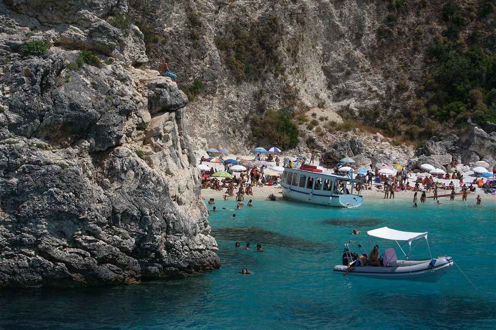 The turquoise water and white cliffs of Agiofili beach near Sivota on southern Lefkada