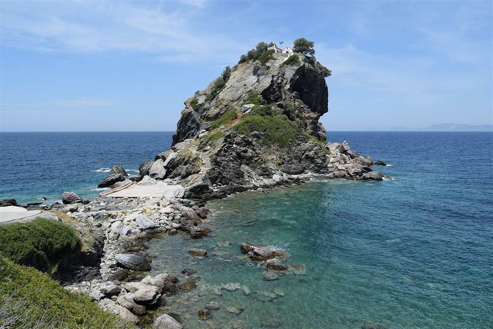 The Agios Ioannis Kastri chapel on its rock pinnacle at Skopelos, a Skiathos yacht charter stop in the Sporades