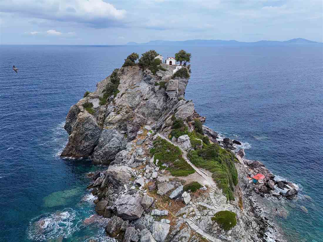 The Agios Ioannis Kastri chapel on its sea rock on Skopelos, the Mamma Mia island, seen on a Skopelos yacht charter