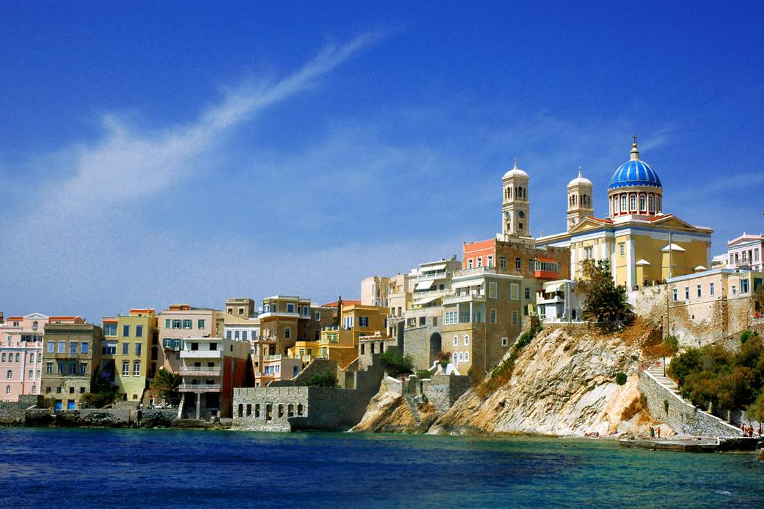The Vaporia quarter of Ermoupoli under the blue dome of Saint Nicholas, the Syros food tour setting