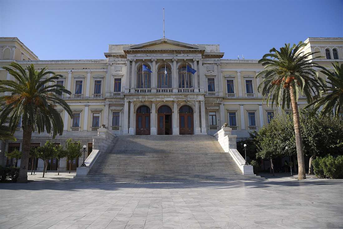 The neoclassical town hall on Miaouli Square in Ermoupoli on Syros, a Syros yacht charter base