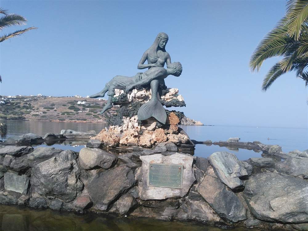 The seafront and calm bay of Kini on Syros, a Syros yacht charter anchorage