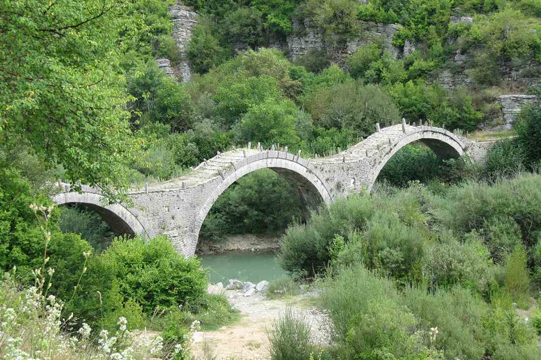 Zagori jeep tour stop at the three-arched Plakidas bridge near Kipi