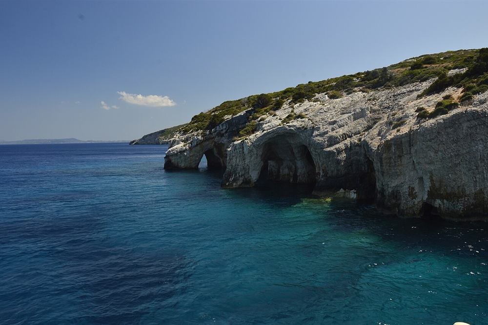 The Blue Caves arches under the cliffs at Cape Skinari, Zakynthos