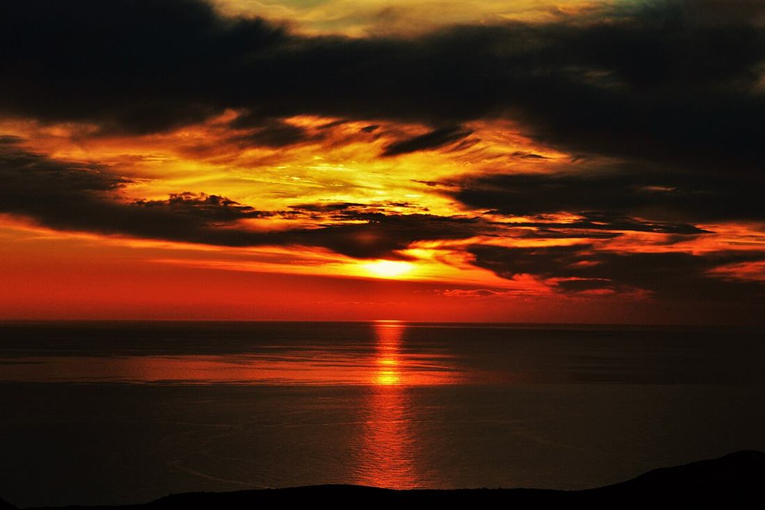 The sun going down over the Ionian off Zakynthos