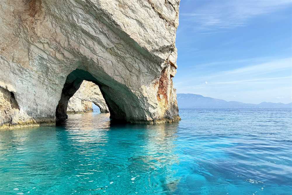 The white sea arches and turquoise water of the Blue Caves of Zakynthos, a Zakynthos yacht charter stop