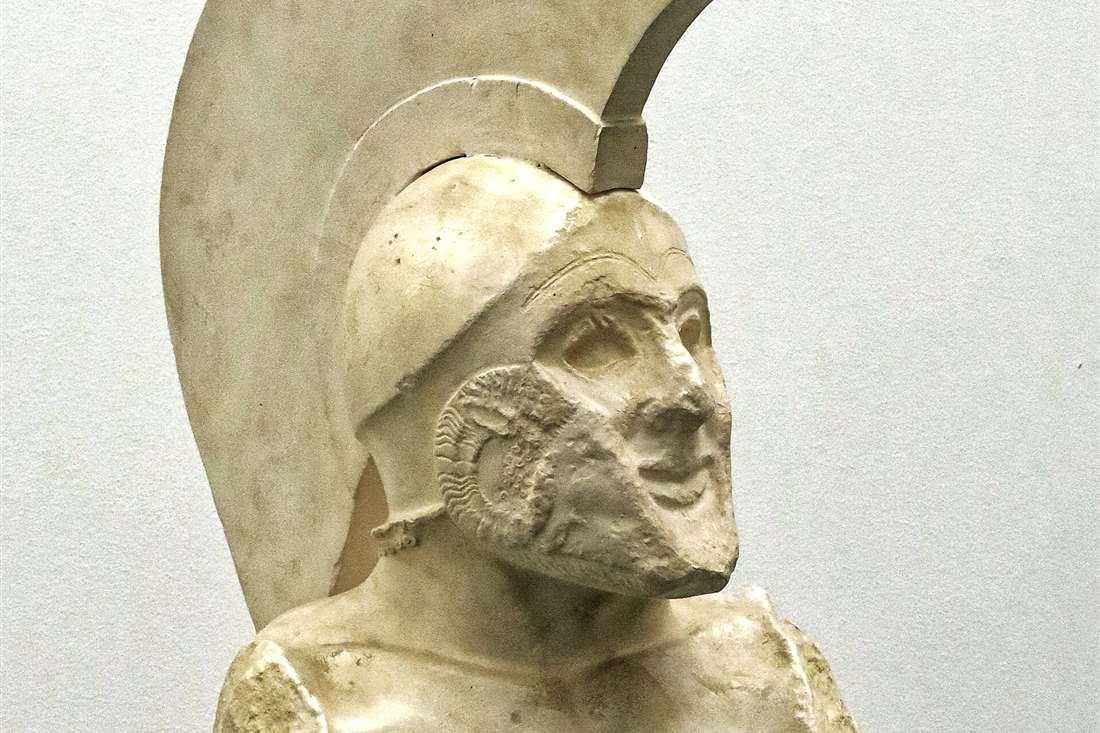 The marble bust of a Spartan hoplite known as Leonidas, wearing a crested helmet, in the Archaeological Museum of Sparta.