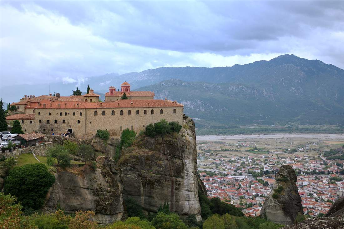 The St Stephen monastery on its rock above Kalambaka, with the Thessaly plain and mountains behind.