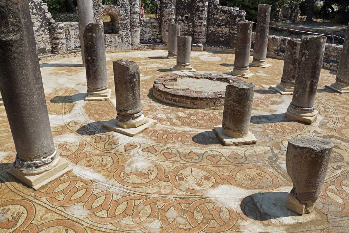 Butrint tours see the mosaic floor and the columns of the Butrint baptistery