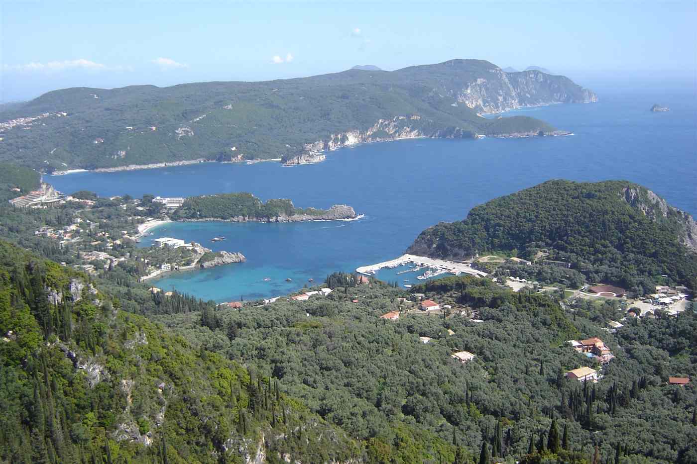 Paleokastritsa bays on the west coast of Corfu seen from the hills above
