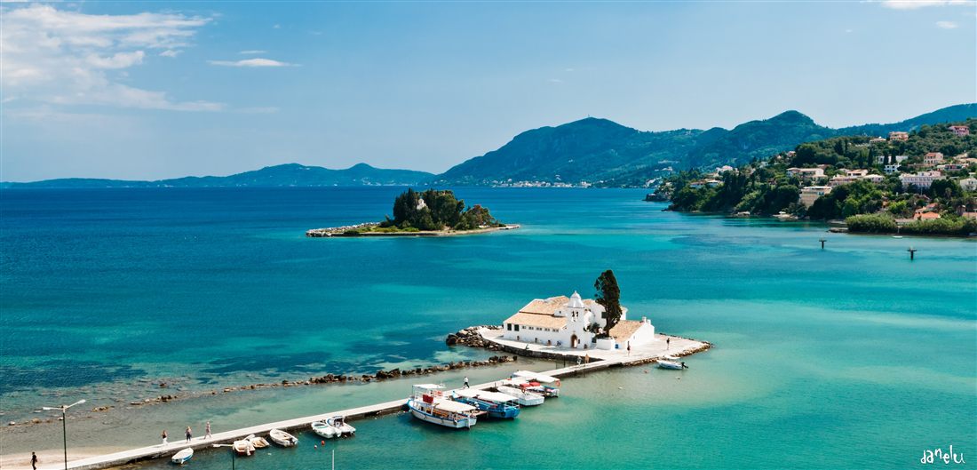The Vlacherna monastery on its causeway and the islet of Pontikonisi below Kanoni, a stop on a Corfu shore excursion.