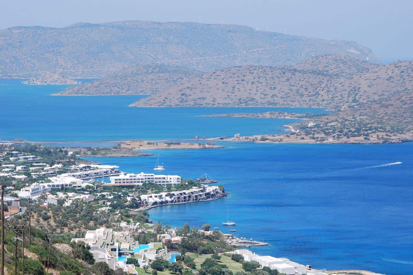 The bay of Elounda with its resort hotels and the Spinalonga peninsula, the drop-off area for Elounda transfers
