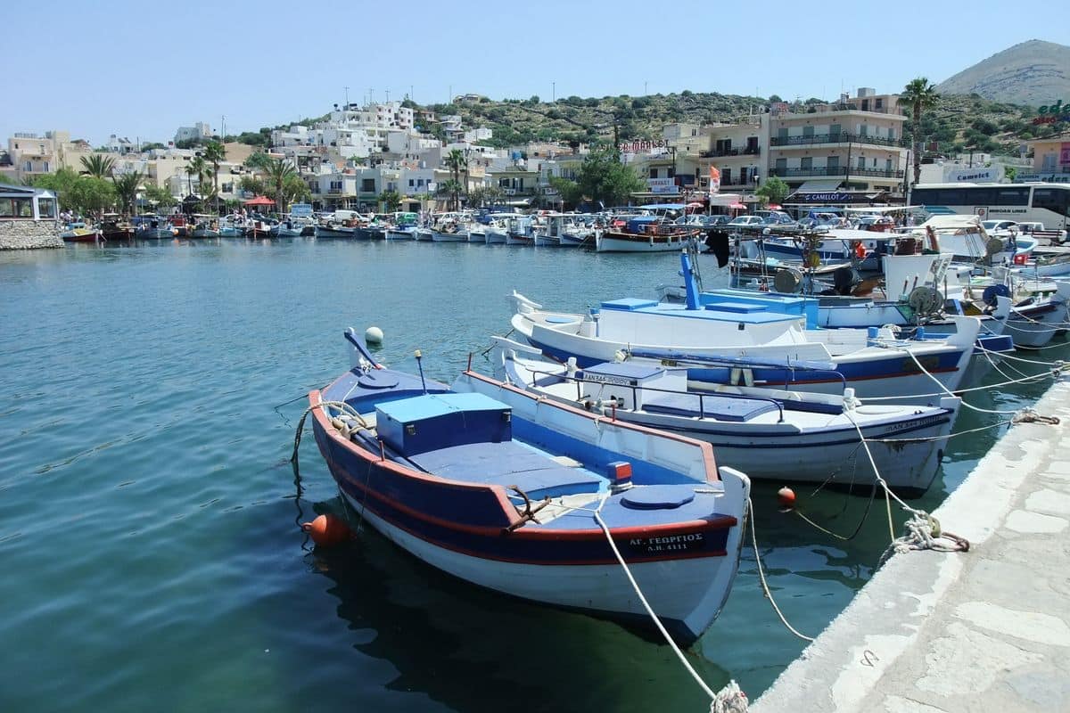Fishing boats in the small harbour of Elounda, a pickup point for Elounda transfers