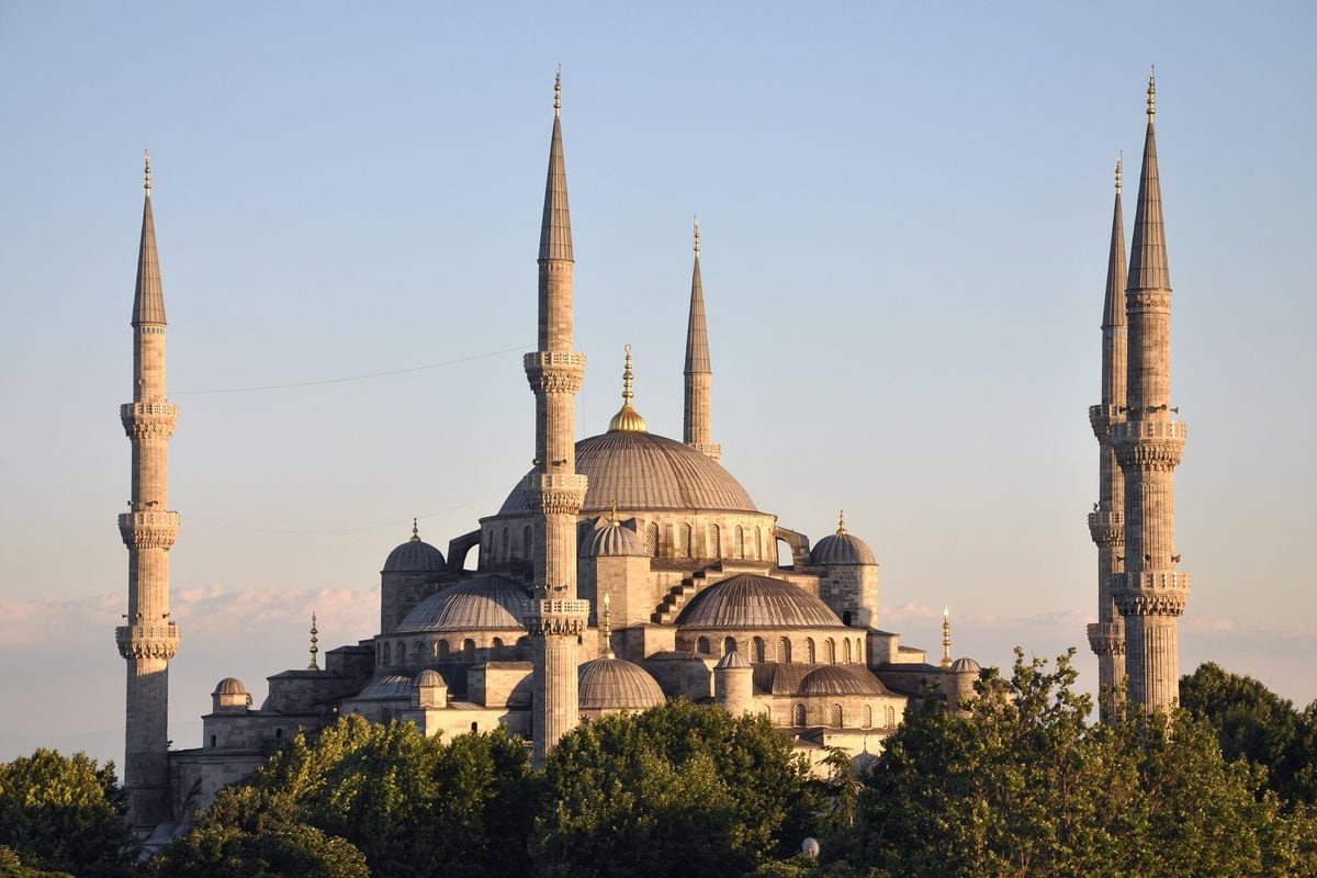 Istanbul tours visit the Blue Mosque, the Sultan Ahmed Mosque with its minarets and domes