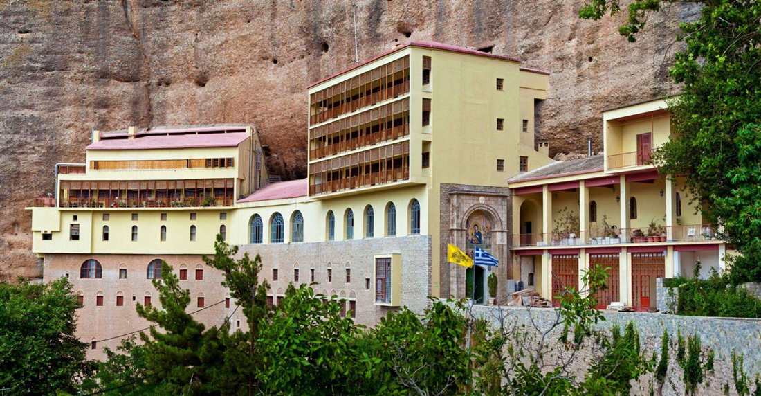 The Mega Spilaio monastery built into a rock cliff above the Vouraikos valley near Kalavrita