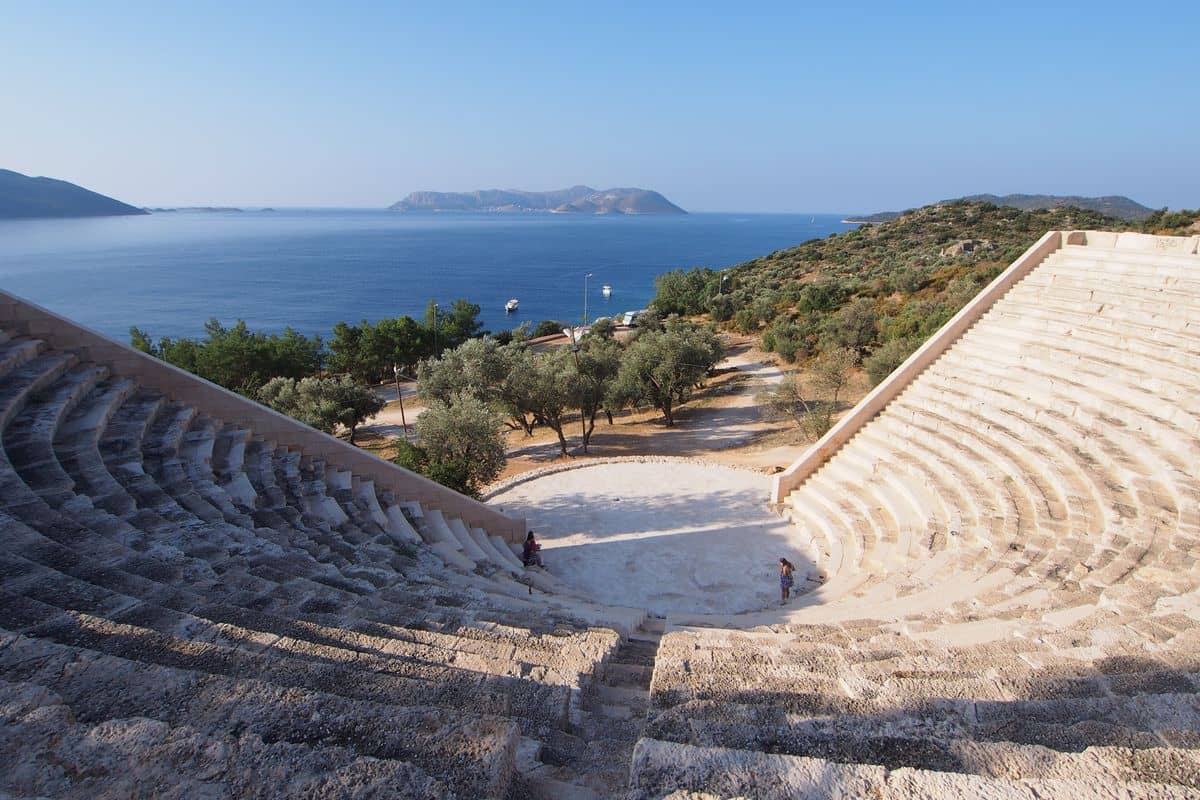 Kas tours visit the Hellenistic theatre of Antiphellos above the sea west of Kas
